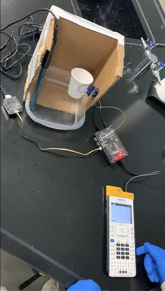 Engineering design project that used the TI Innovator™ Hub, TI-SensorLink Adapter and a servo motor. Based on pH values, the motor turned the cup to dump pH lowering material. This activity was a modification from the TI STEM Project “Some Like It Tepid.”
