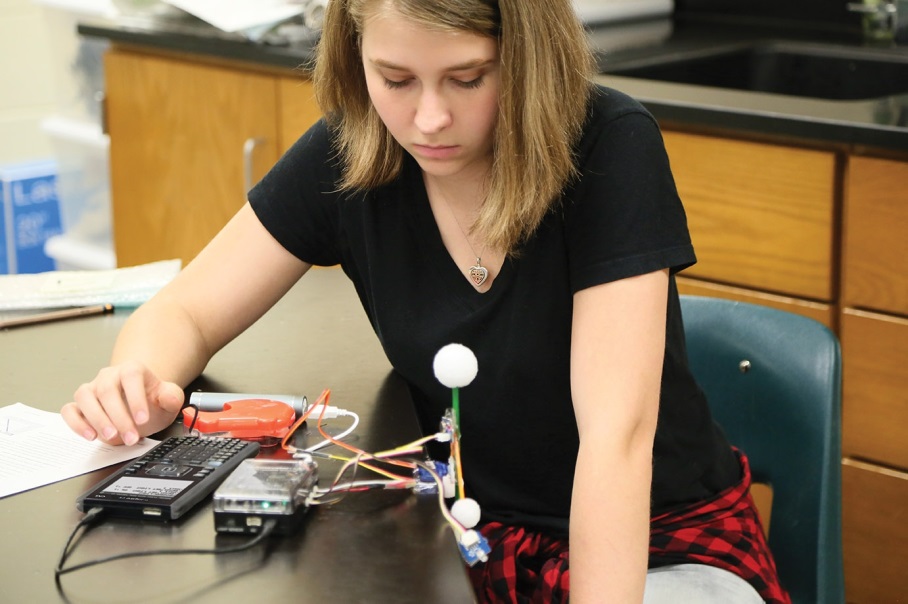 This student is creating a model of a product based on a TI activity.